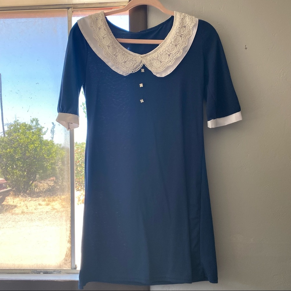 Navy blue collared dress.